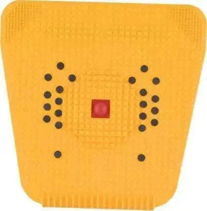 Yellow acupressure mat with raised nubs and dot grid patterns