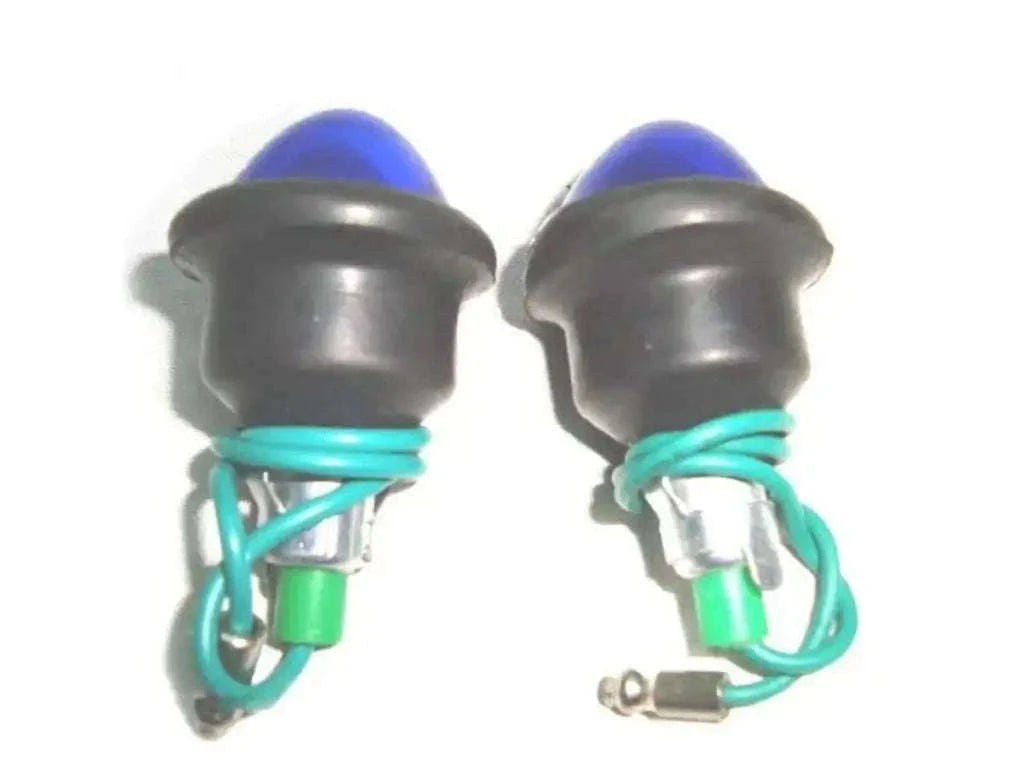 Pilot light assembly pair with blue caps, black bases, and green wiring with bulb sockets