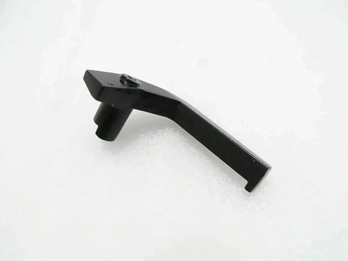 Left window handle, dark gray with mounting stud and screw hole