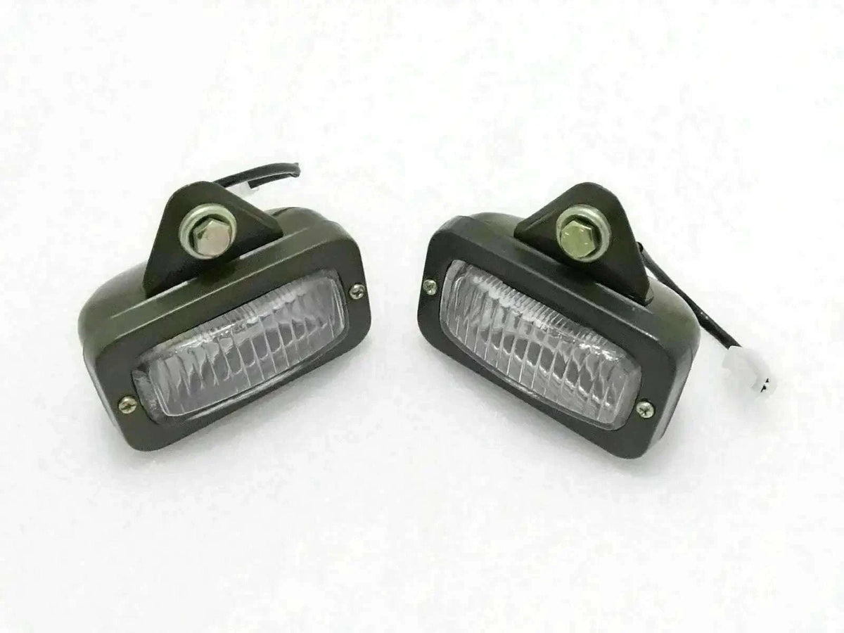 Willys Jeep military parking light pair with clear lenses and olive housings