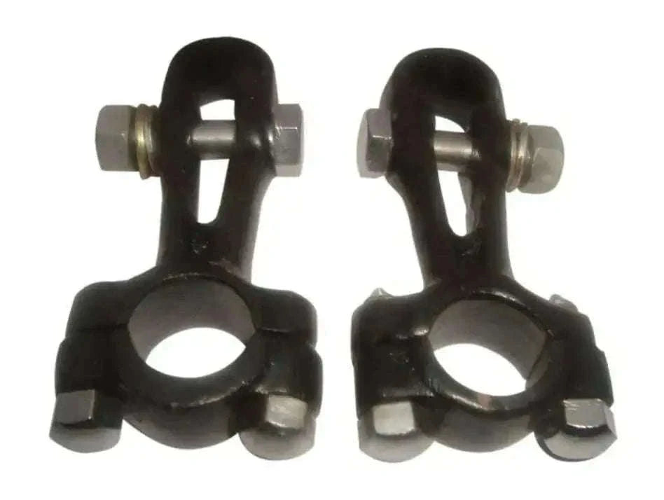 Pair of black 7/8-inch handlebar fork clamps with mounting bolts