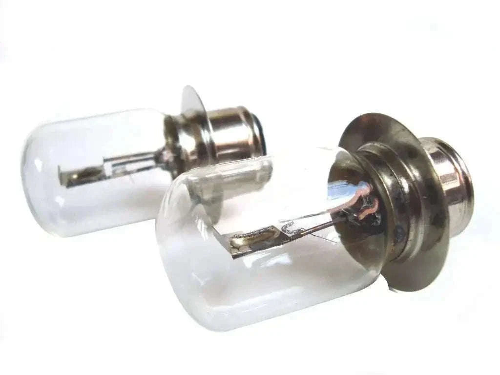 Headlamp bulb with glass twin filaments and metal base, clear.
