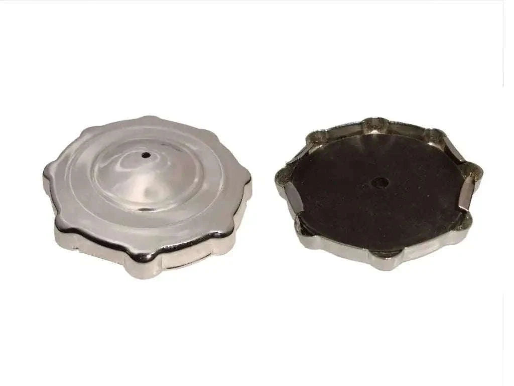 Push-style metal gas tank caps, round with locking tabs and center hole