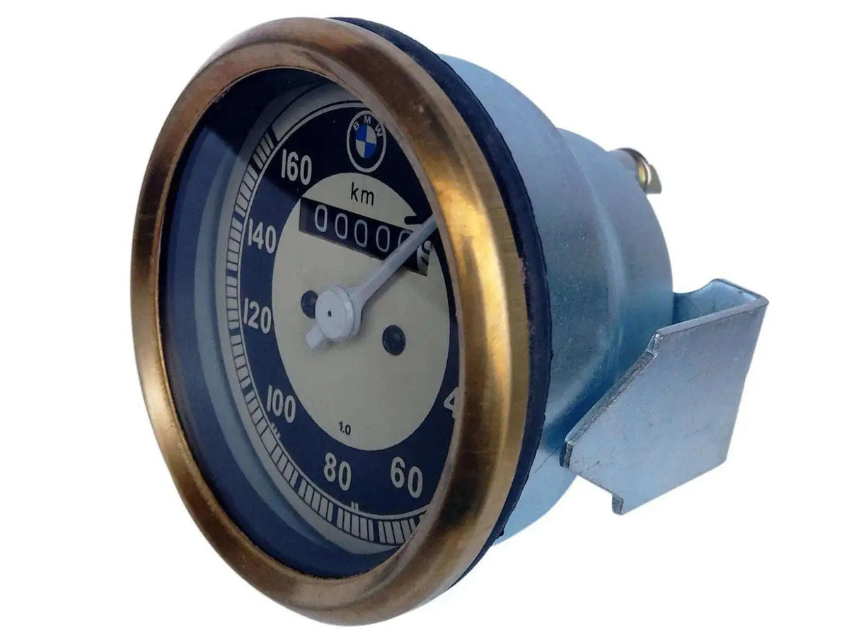 Speedometer with brass bezel, round dial face with km/h markings up to 160