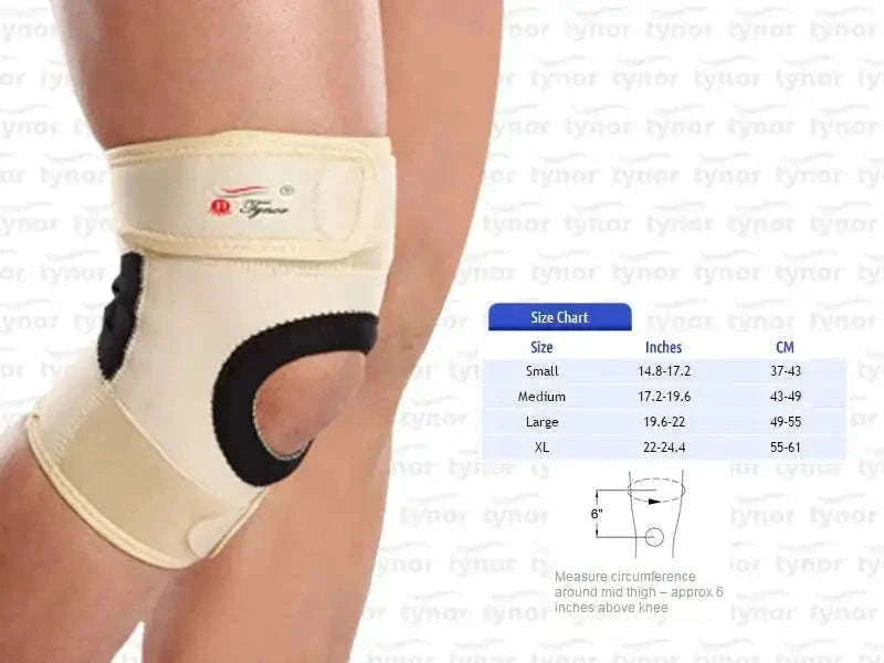Beige neoprene knee support with front strap and black stabilizer, on leg
