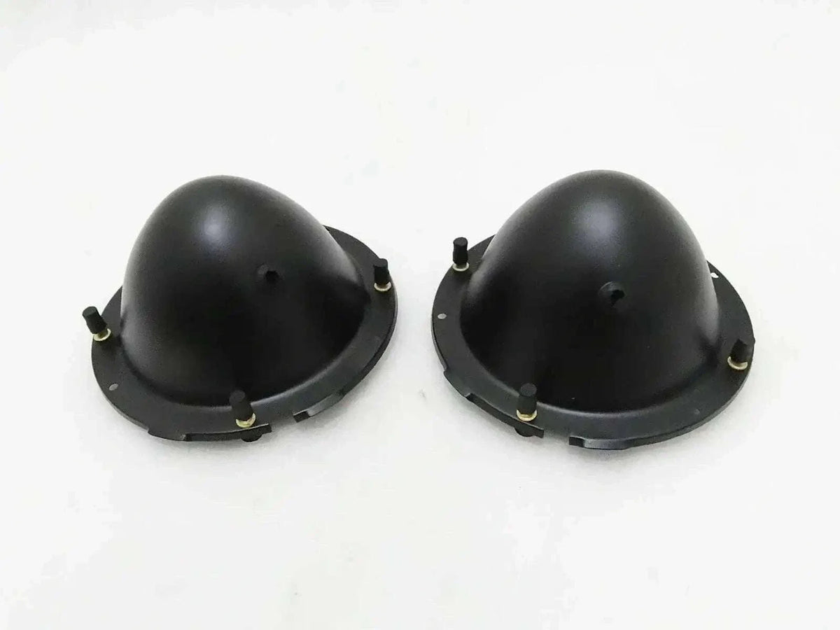 Pair of black headlight holding buckets with mounting tabs and screws