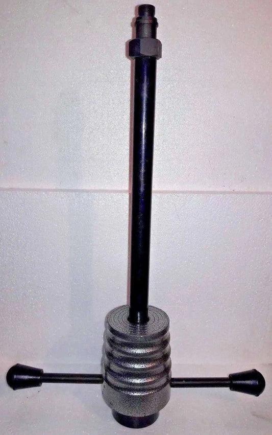 Injector puller tool with long threaded rod and spring-loaded base