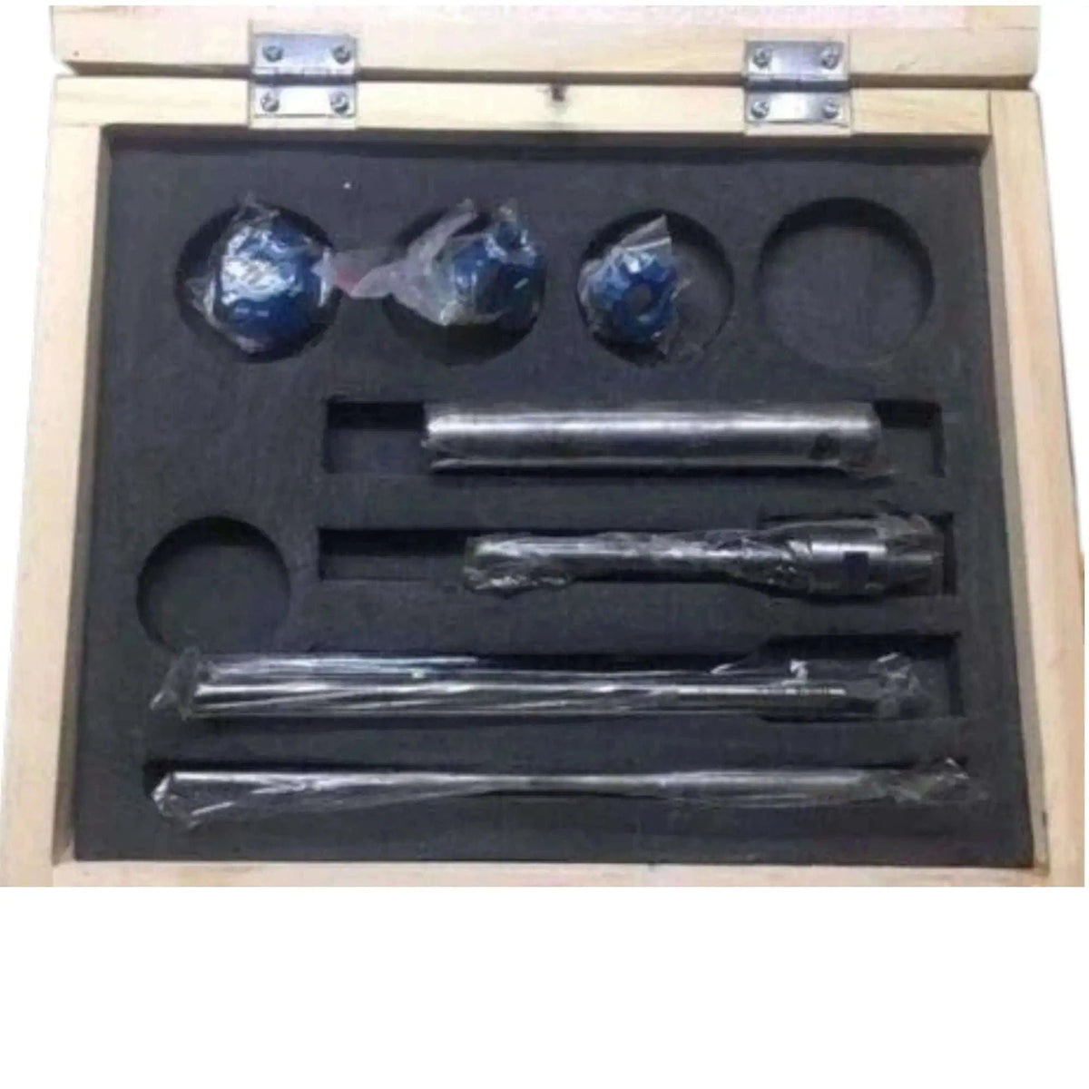 Briggs engine valve seat cutter set in a wooden case, includes multiple cutters and tools for precision engine work