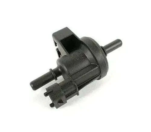 Canister purge valve with two hose connectors and barbed inlet, black plastic