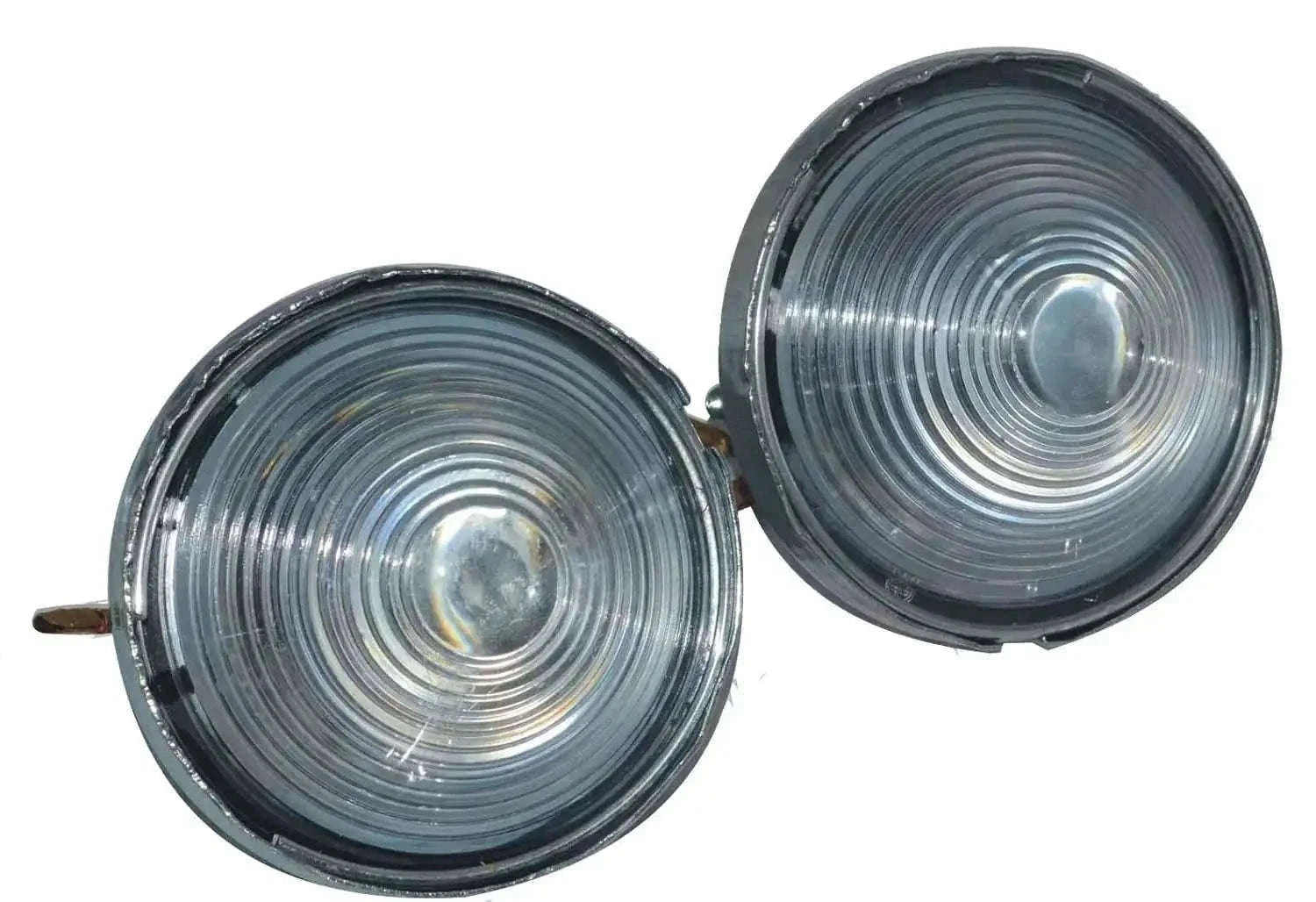 Pair of round parking/turn signal lights, ribbed clear lenses, chrome bezels