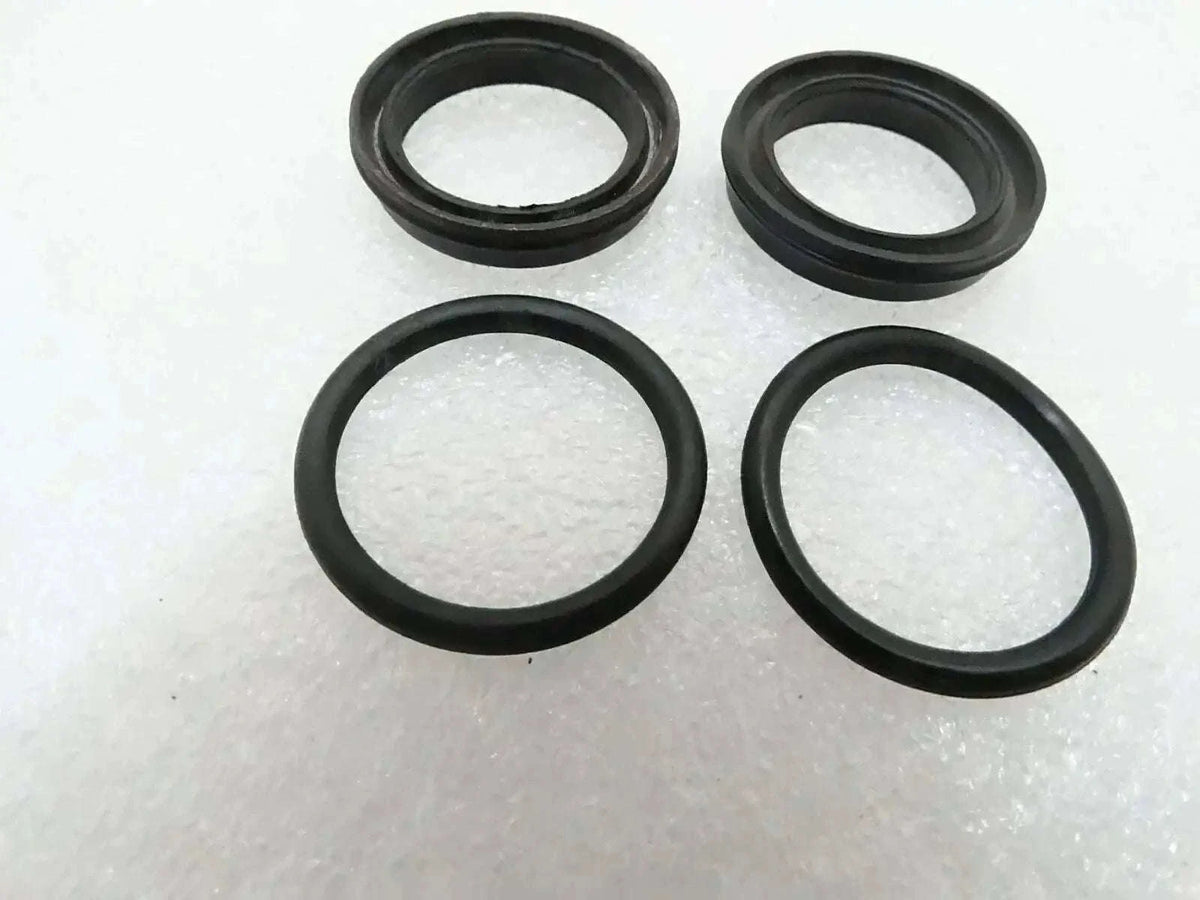 Set of four black rubber seal rings