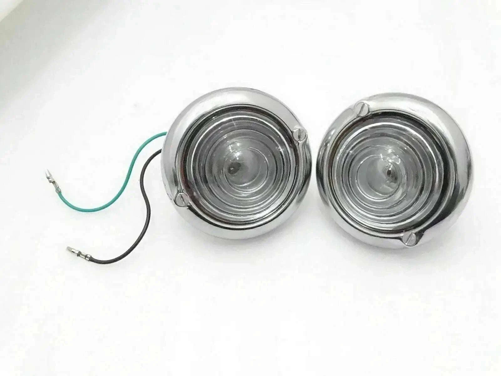 Pair of chrome clear turn signal indicator lights with round lenses