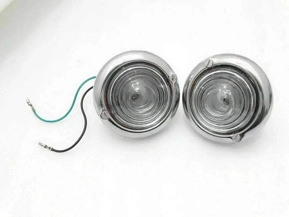 Pair of chrome clear turn signal indicator lights with round lenses