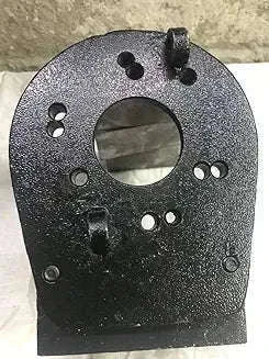 Metal pump housing plate with circular opening and multiple bolt holes