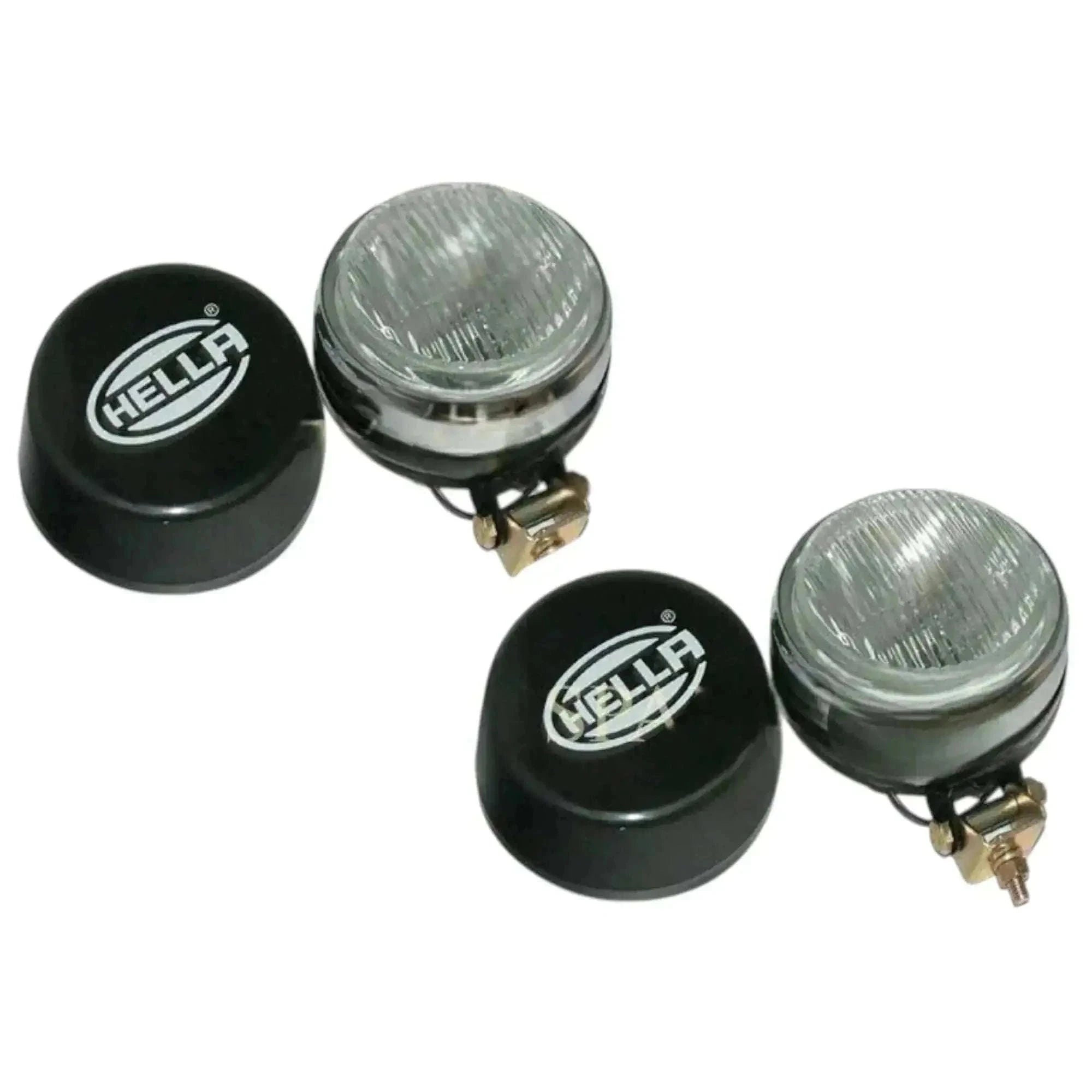Pair of fog lamps with clear lenses and black covers, Hella-branded