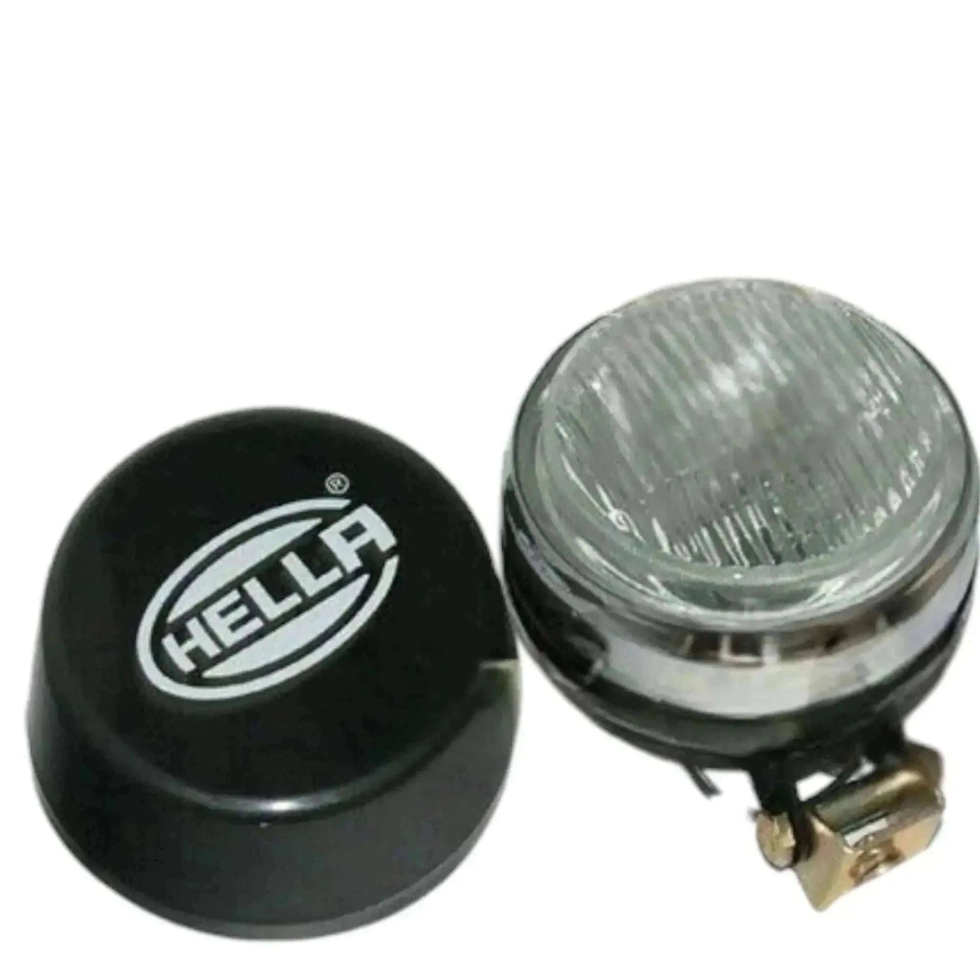 Hella fog lamp with clear lens and black cover, bulb holder visible
