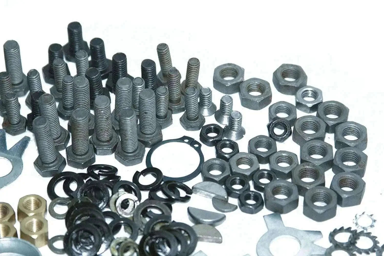 Massey Ferguson engine repair kit with nuts, bolts, and washers