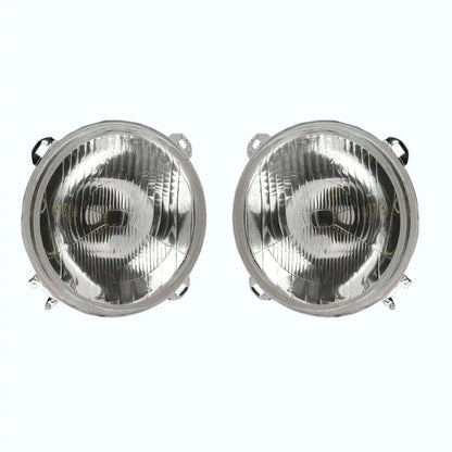 Pair of round headlight lamps with chrome reflector and clear glass cover