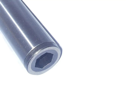 Cylindrical metal sleeve with hexagonal inner opening