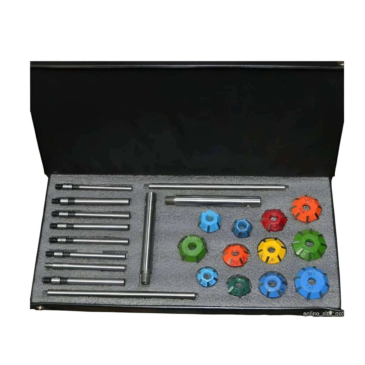 Carbide valve seat restoration kit with various tools and cutters for engine maintenance