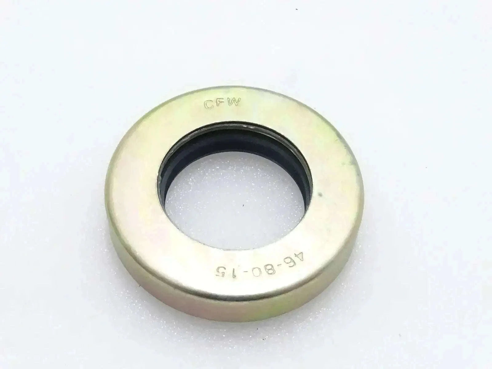 Oil seal with metal outer ring and black inner lip, stamped 904/50040