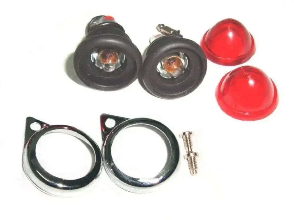 Pair of 12V red pilot lamps with black rims, bulb lenses, and mounting screws