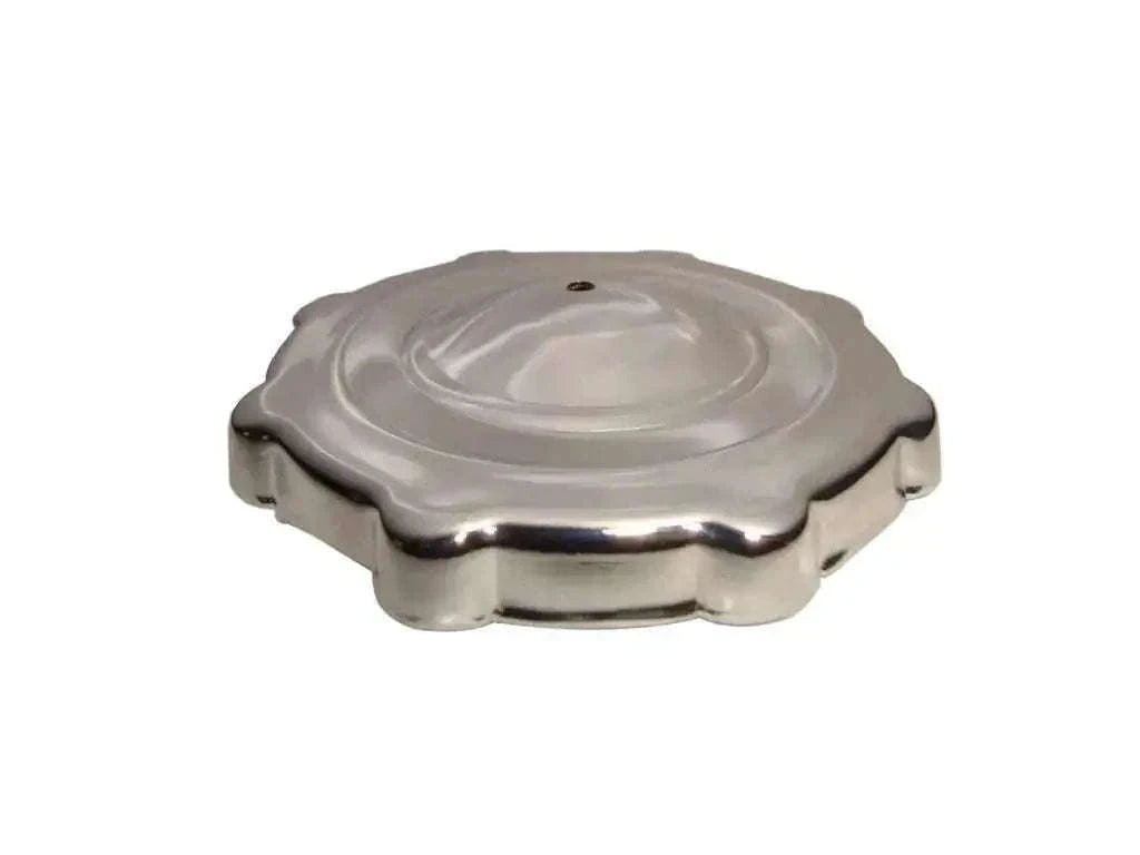Metal push-style fuel tank cap with circular top