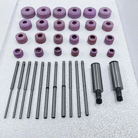 Sioux valve seat grinding wheels set with multiple sizes in pink abrasive material for valve seat resurfacing