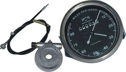 Black-faced analog speedometer with chrome bezel, cable and mounting ring