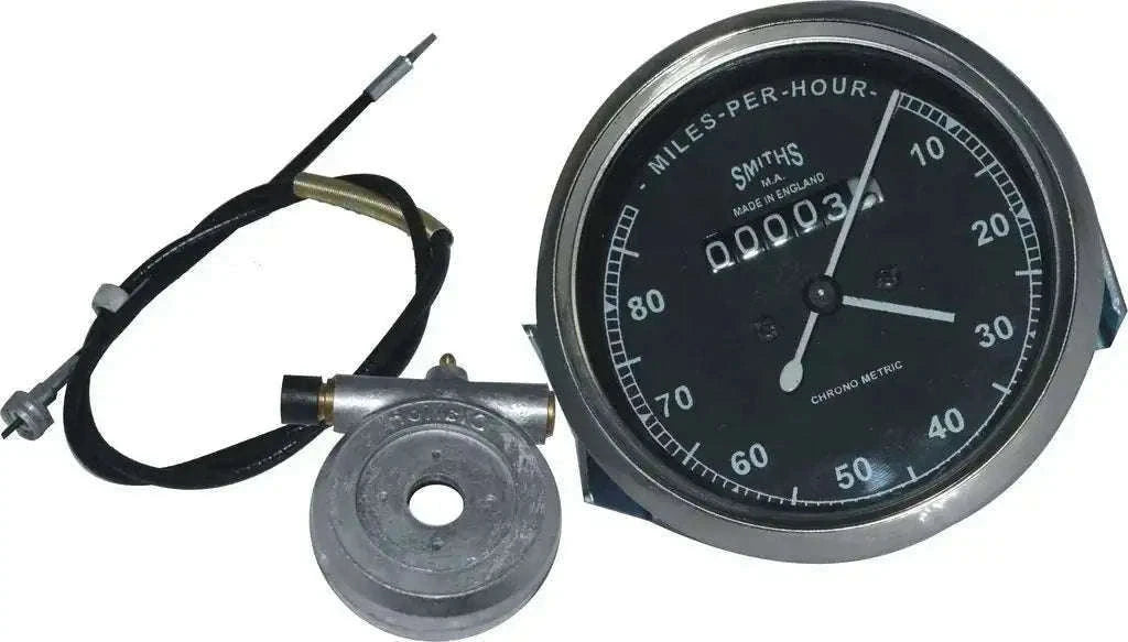 Smiths motorcycle speedometer gauge with black face, chrome bezel, and wiring harness