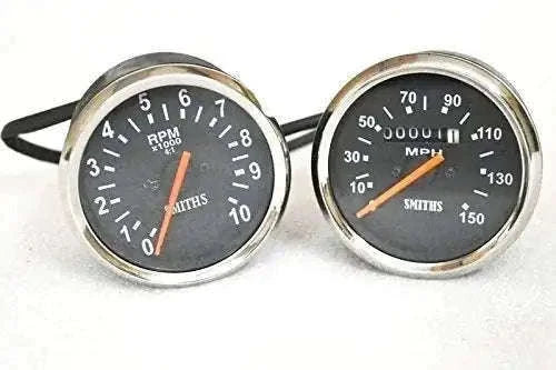 Smith tachometer and speedometer pair, black dials, chrome bezels