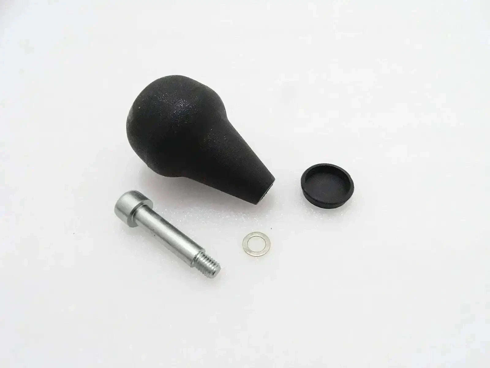 Steering knob kit with black rubber grip, metal shaft, and retaining ring