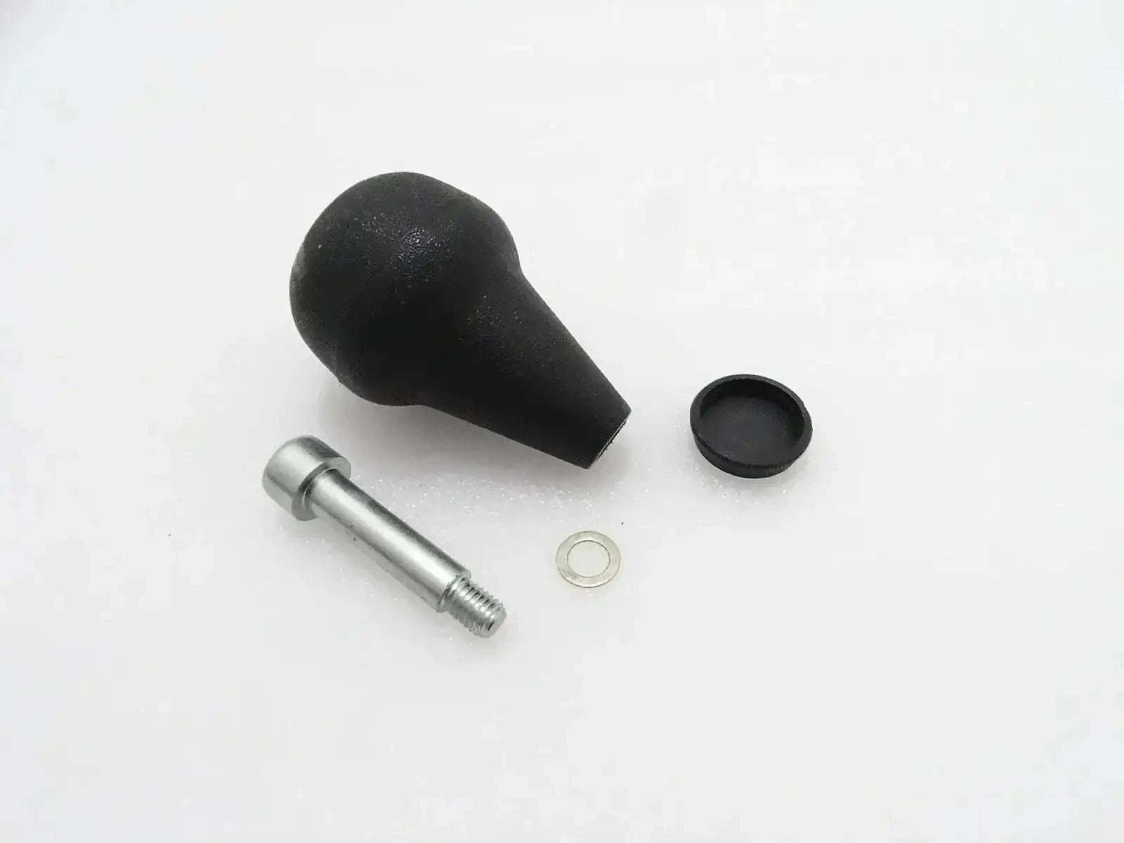 Steering knob kit with black rubber grip, metal shaft, and retaining ring