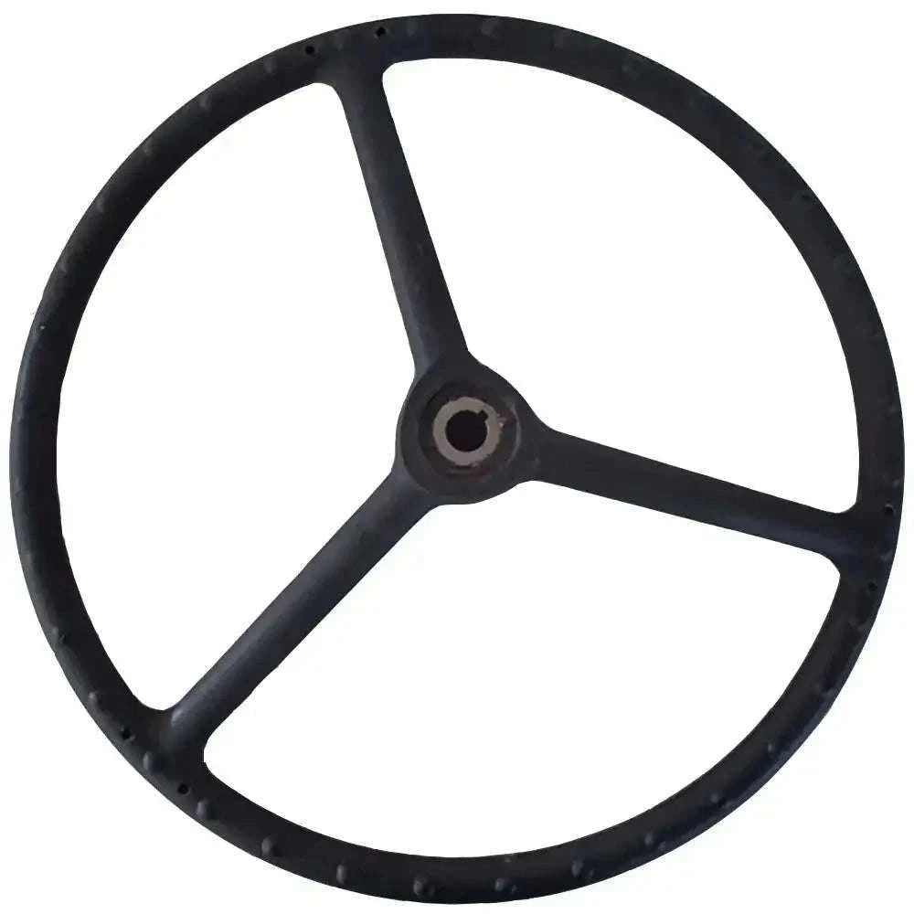 Black steering wheel with round rim, three spokes, and center hub opening.