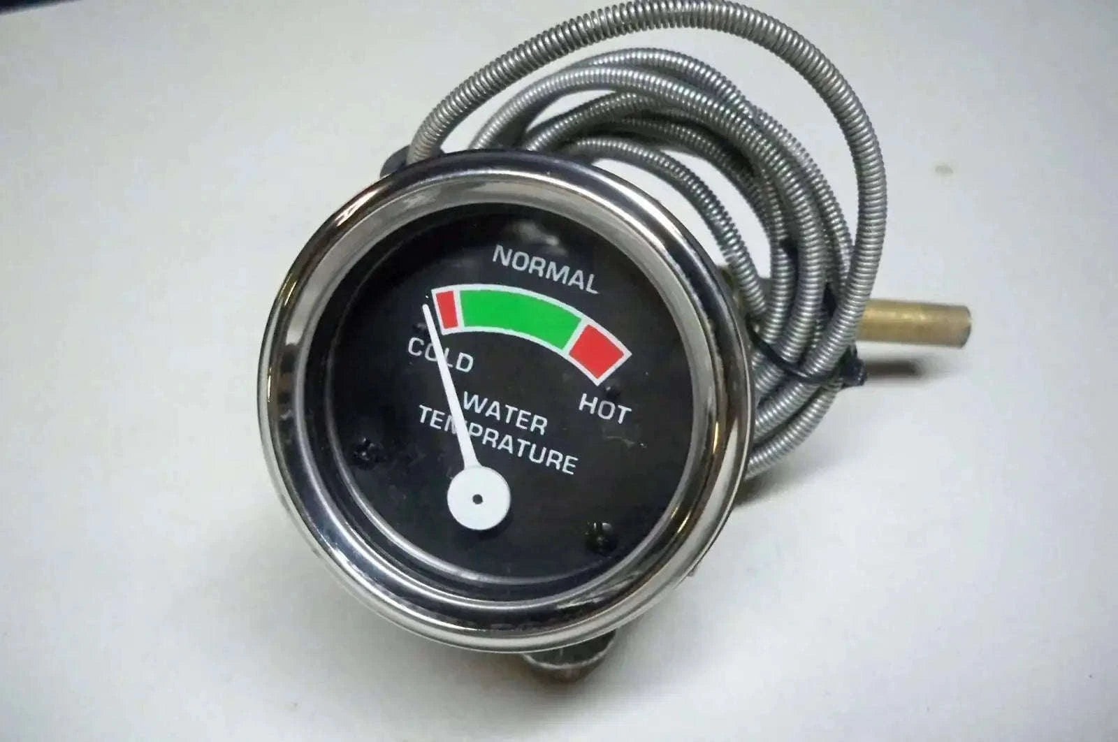 Temperature gauge with chrome bezel, wired sensor and temperature indicator face