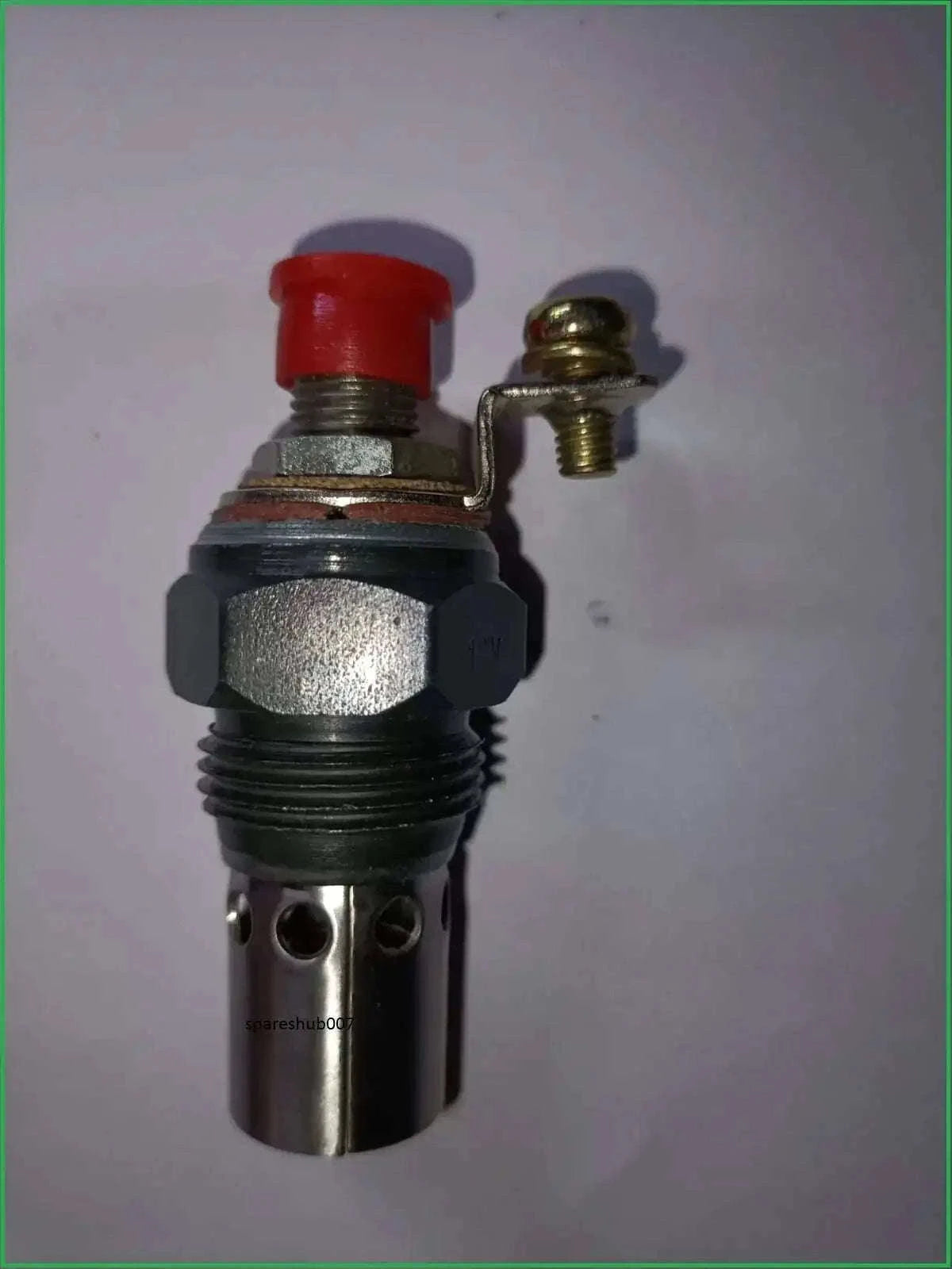 Tractor glow plug, metal construction, compact size, used for efficient engine startup