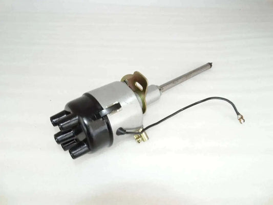 Complete distributor assembly with metal shaft, black housing, and wiring harness