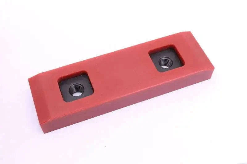 Red wear pad block with two threaded mounting holes