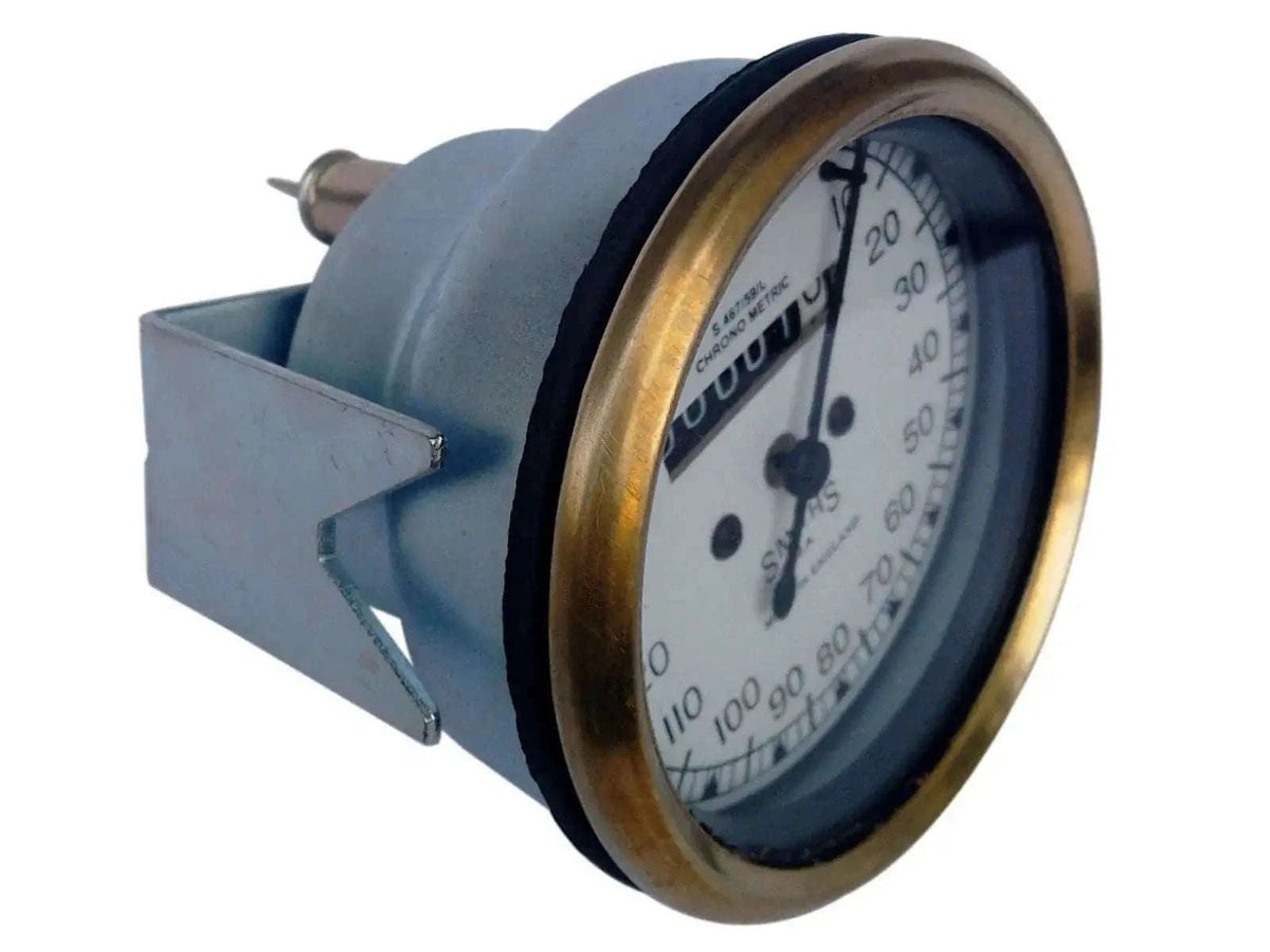 Brass bezel speedometer with white dial, black housing, and needle indicator