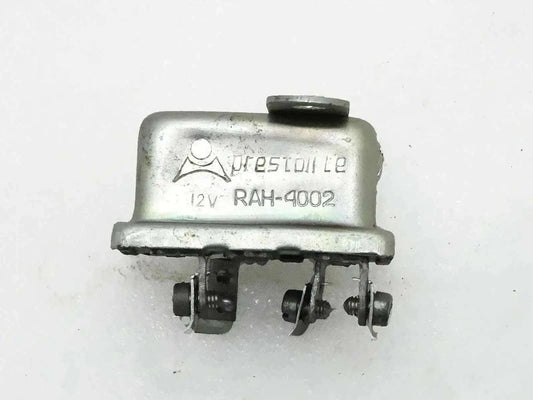 12-volt horn relay with metal housing and multiple electrical terminals