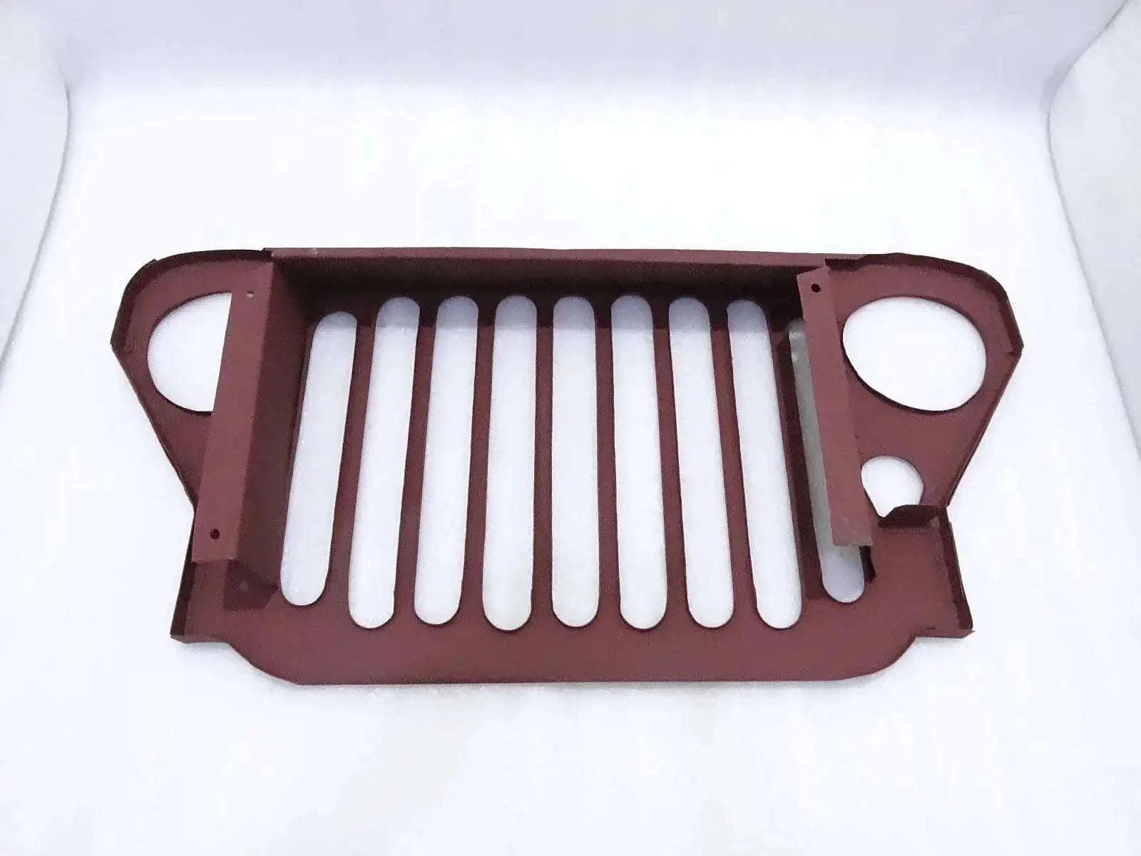 Steel front grille with vertical slats and two round openings, dark brown finish