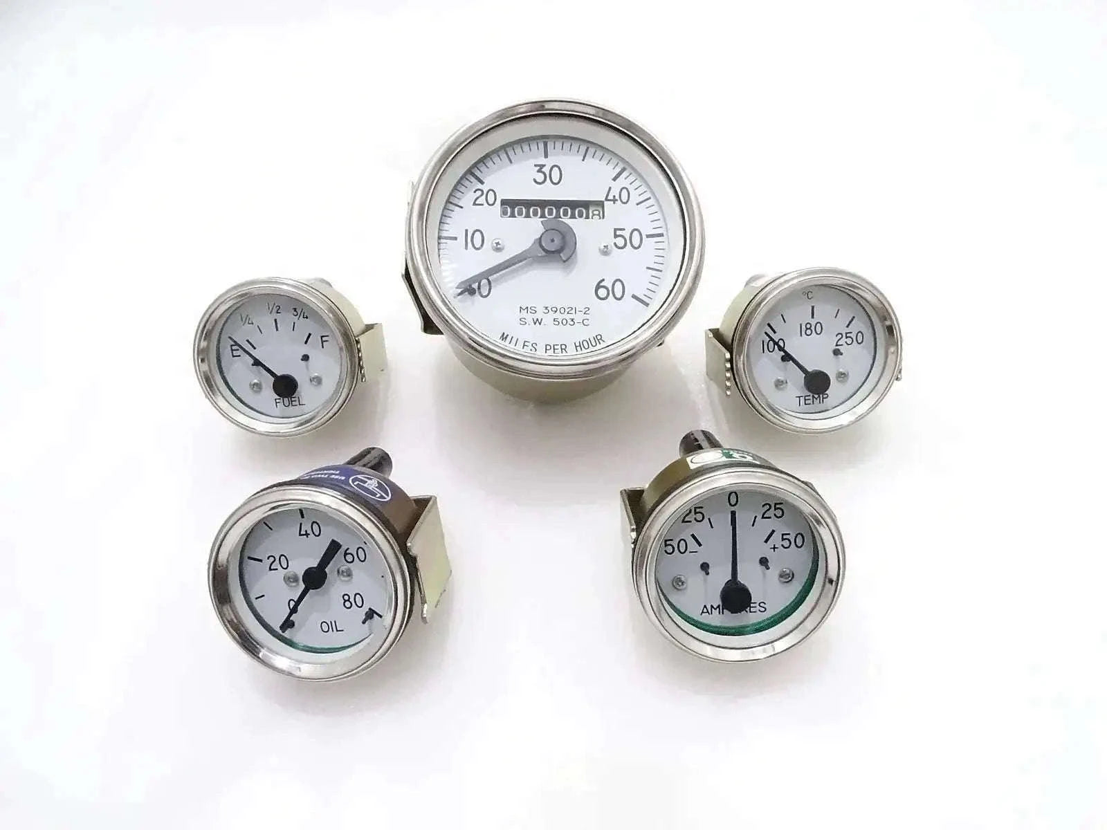 Round analog gauge kit with white faces, speedometer, oil, temp, fuel, amp indicators